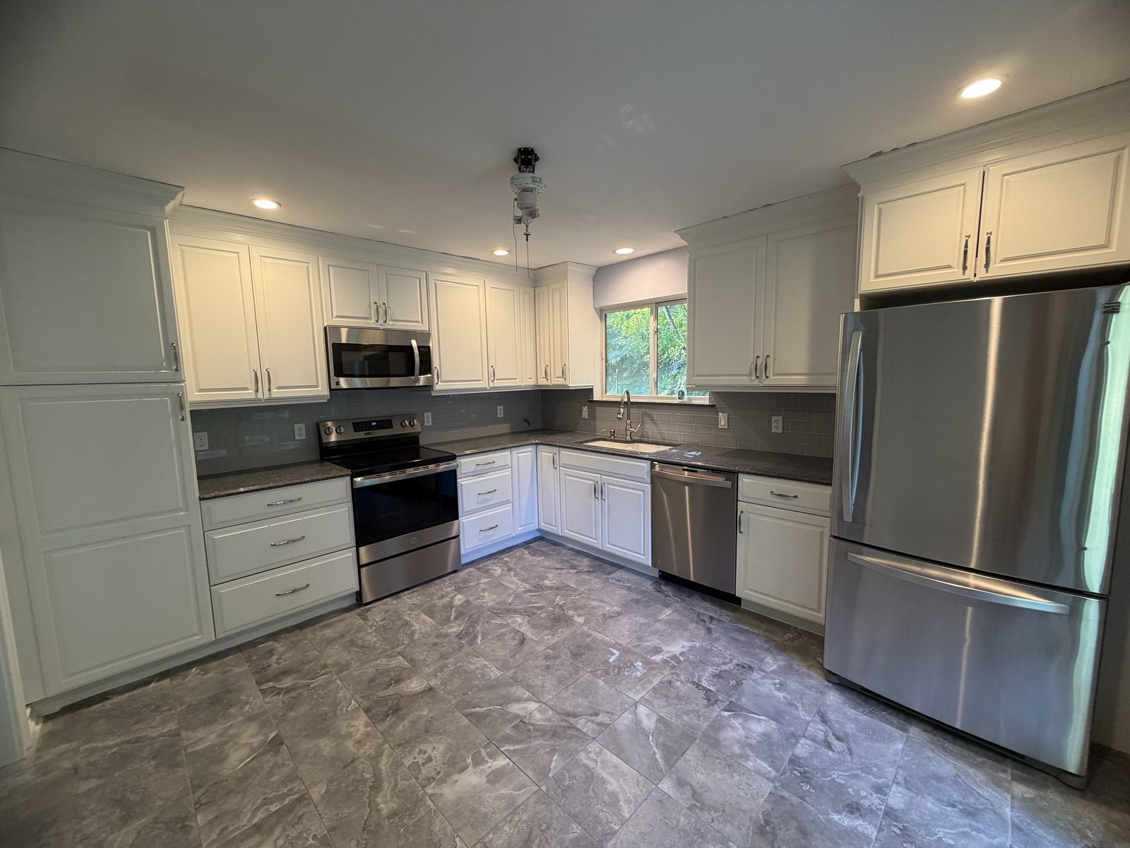 Kitchen cabinets repainted white in Somers NY