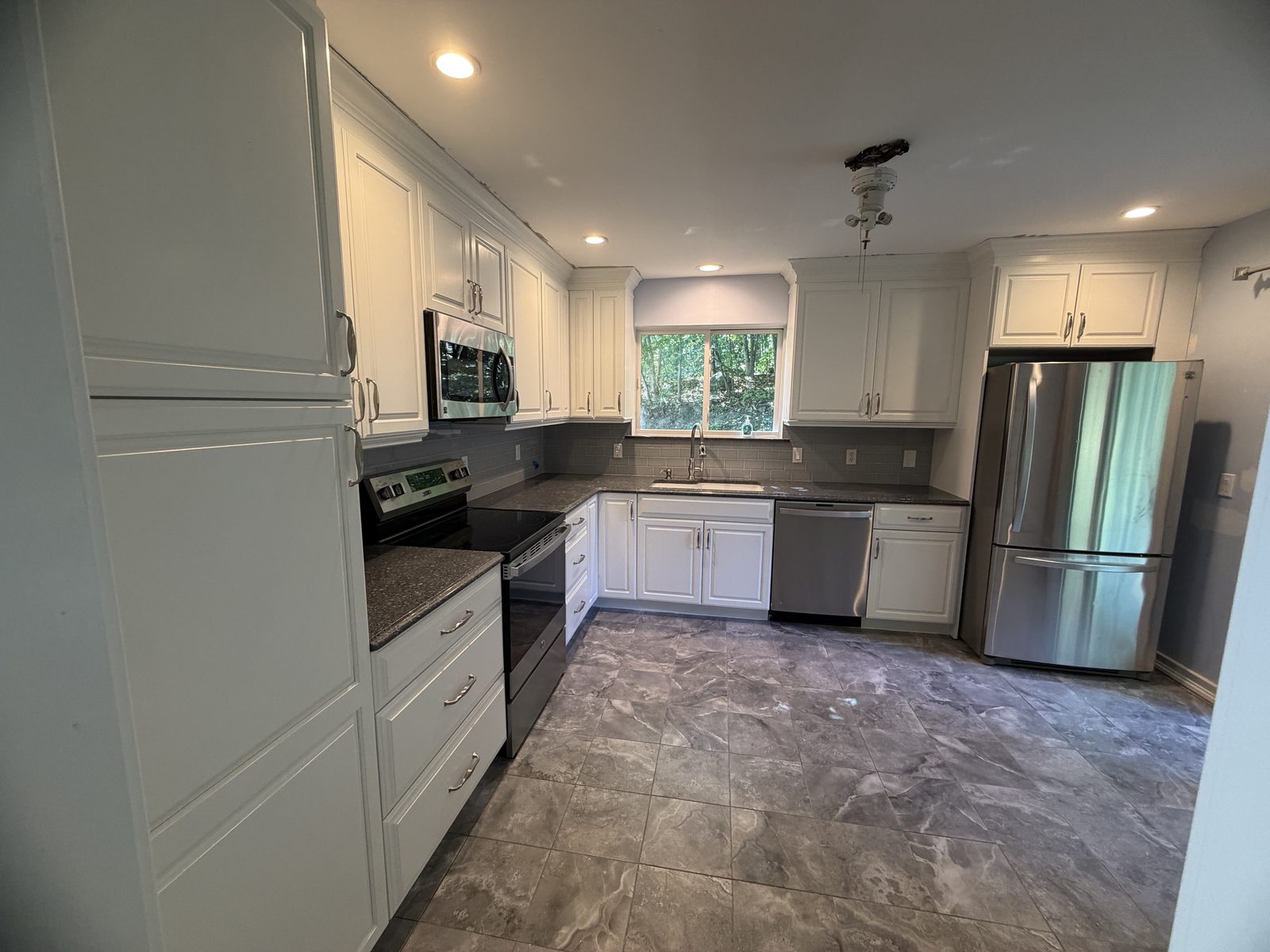Refinished white kitchen cabinet doors and drawers in Somers NY